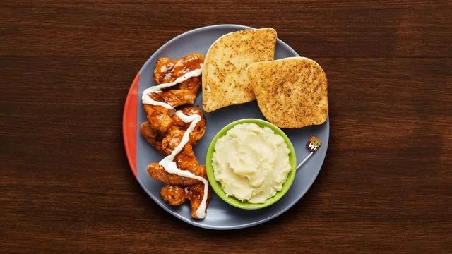 5 Extra Saucy Wings at Nando's
